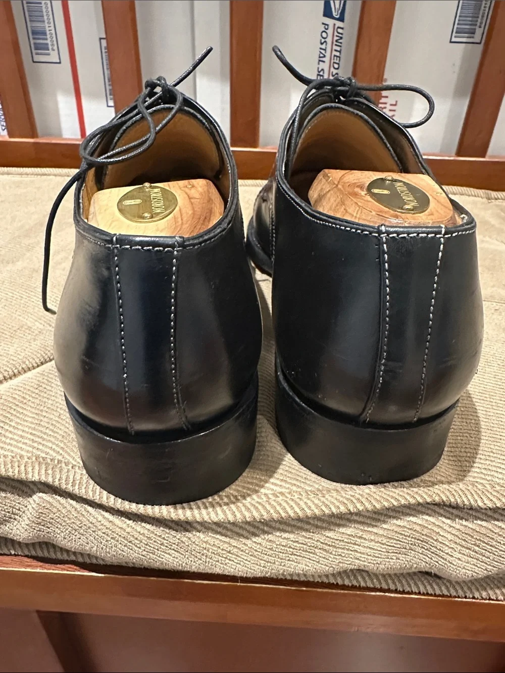 Santoni dress shoes feature a distinct toe medallion. - Picture 4 of 14